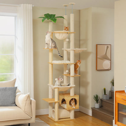 Arbre à chat fixation plafond beige installé dans un coin salon avec plusieurs chats dessus