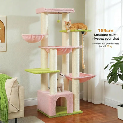 Arbre à chat rose et vert 169 cm installé dans un salon avec deux chats répartis sur les niveaux
